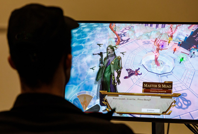 student watching game on screen